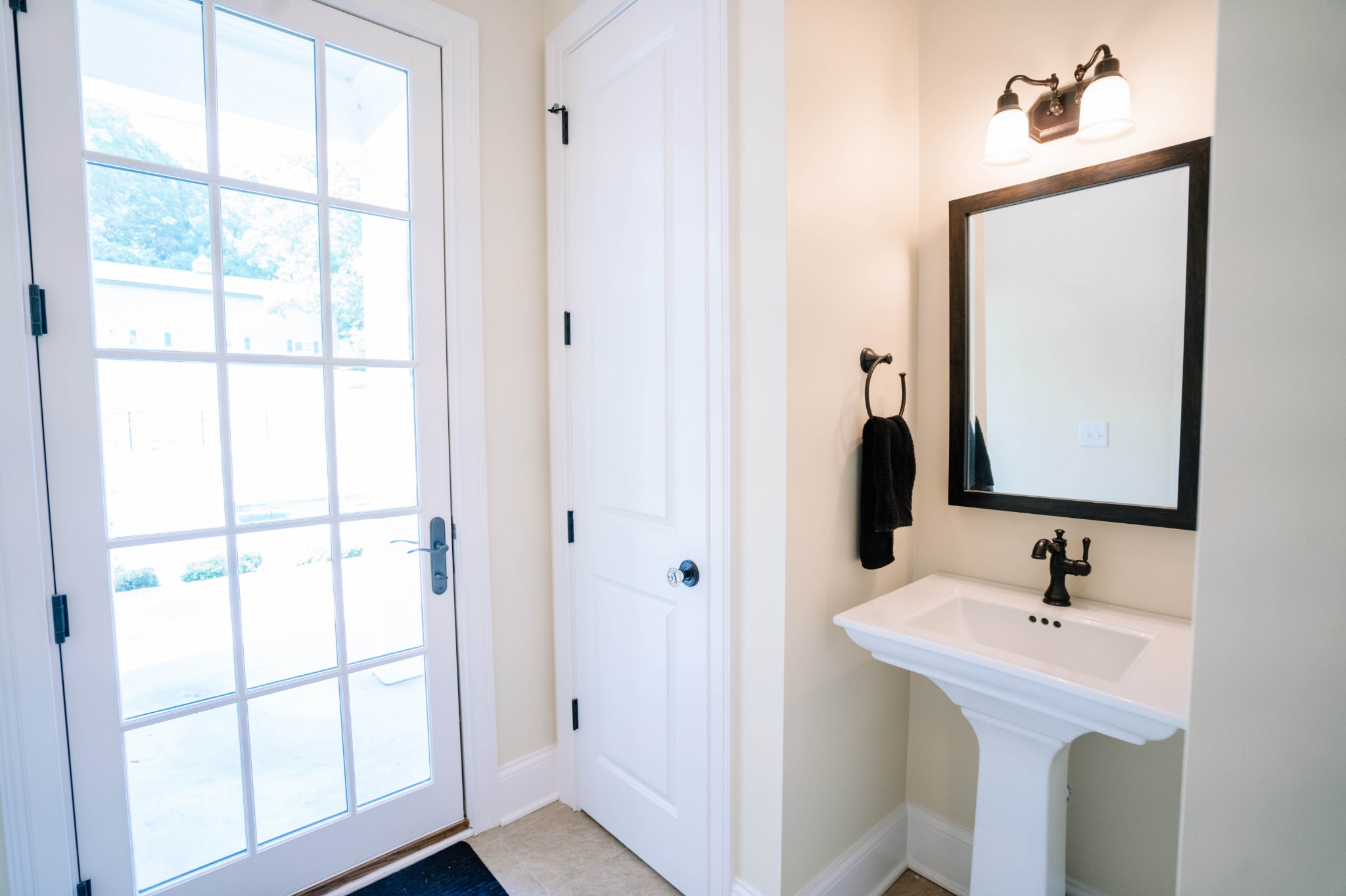 3290 Carl Road Franklin, TN 37064 - Photo 30 of 49 a bathroom with a sink and a mirror