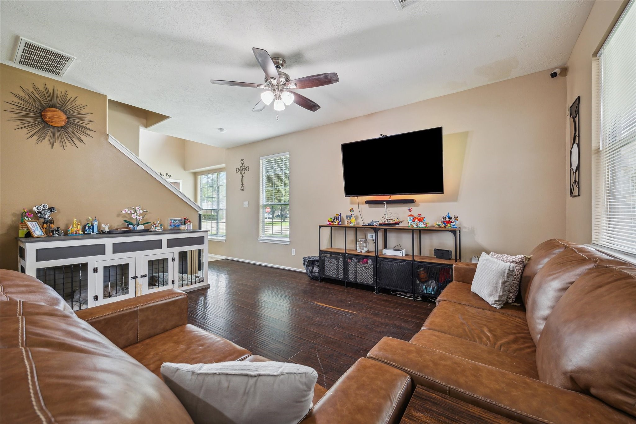 225 Drake Run Lane Dickinson, TX 77539 - Photo 5 of 22 a living room with furniture and a flat screen tv