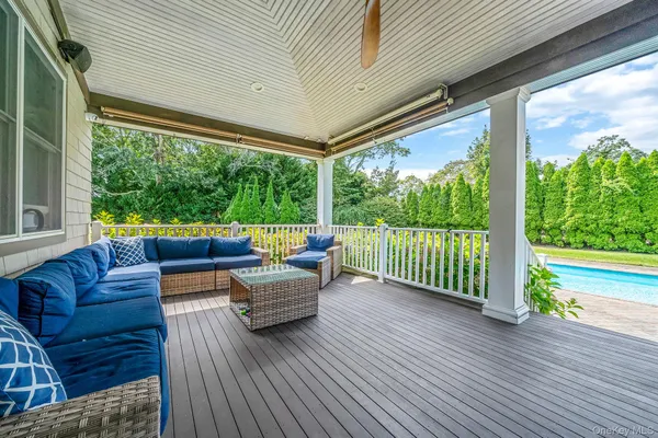 a outdoor living space with furniture and garden view