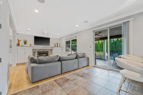 a kitchen with stainless steel appliances granite countertop a stove a sink a oven and a refrigerator