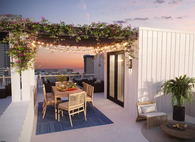 a dining room with furniture and a floor to ceiling window