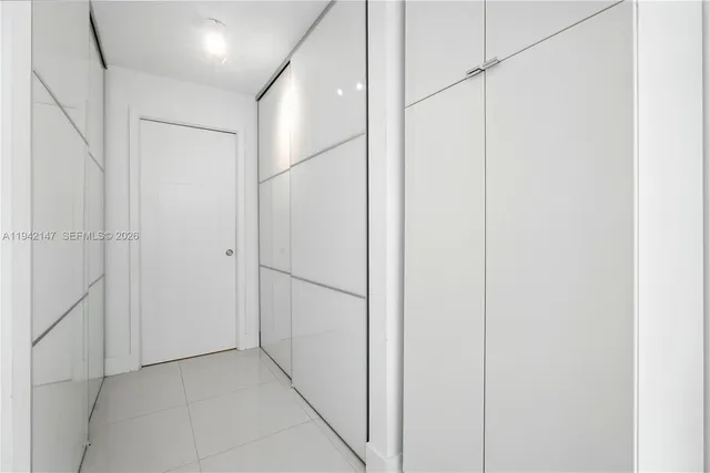 a view of hallway with white walls