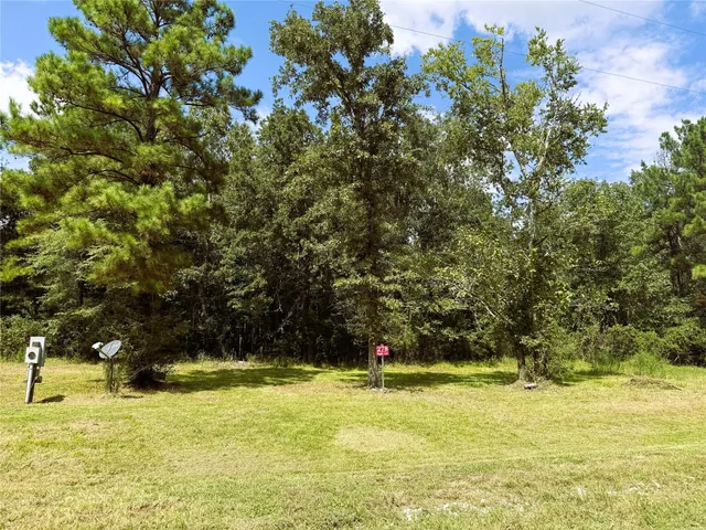 a view of swimming pool from a yard