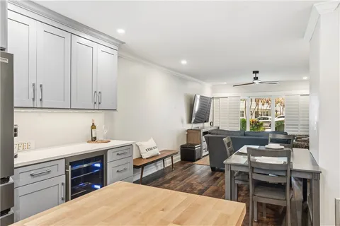 a kitchen with a sink dishwasher a stove and a refrigerator