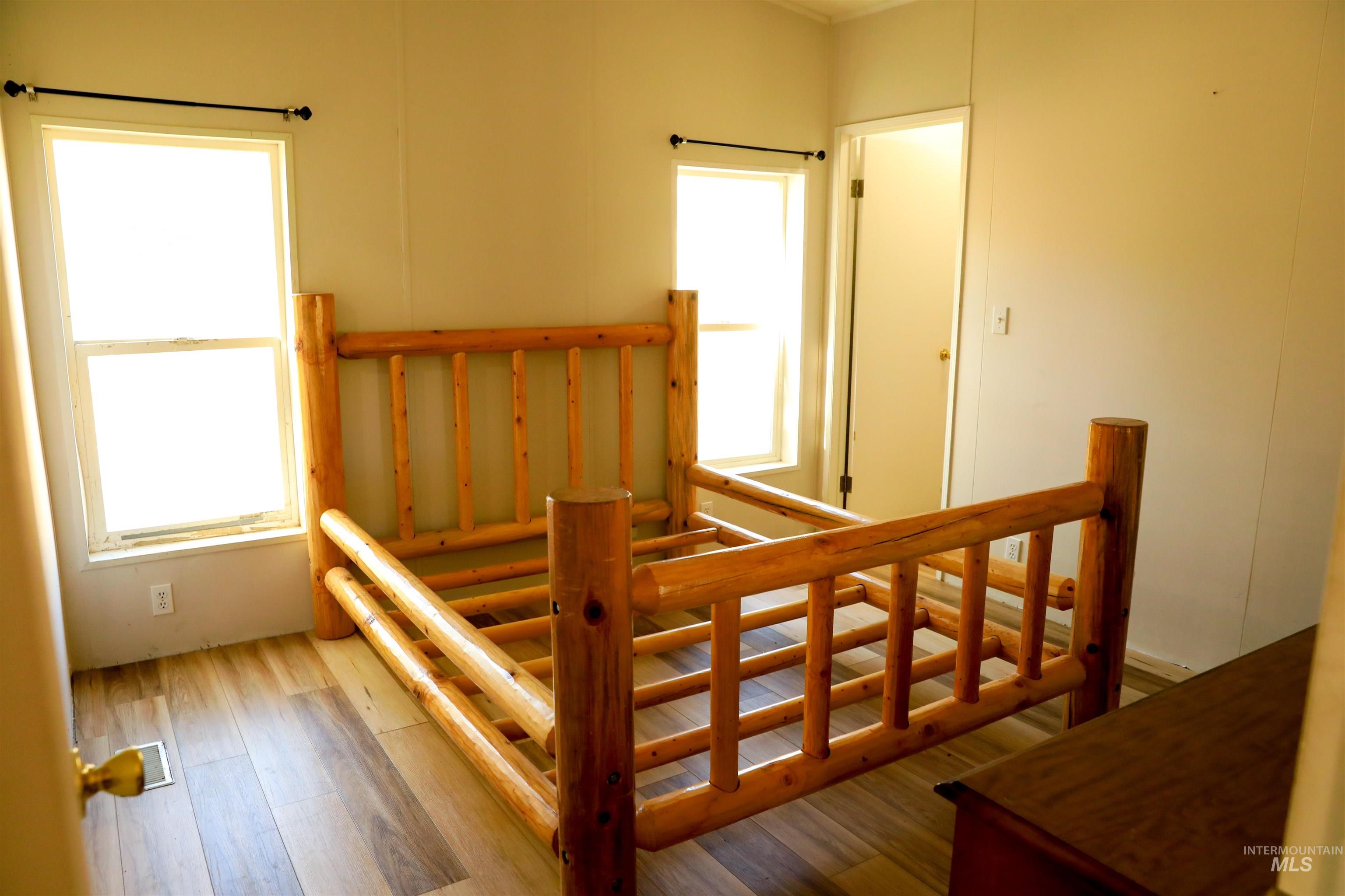 1550 Thousand Springs Road Weiser, ID 83672 - Photo 14 of 42 Stairs featuring wood finished floors