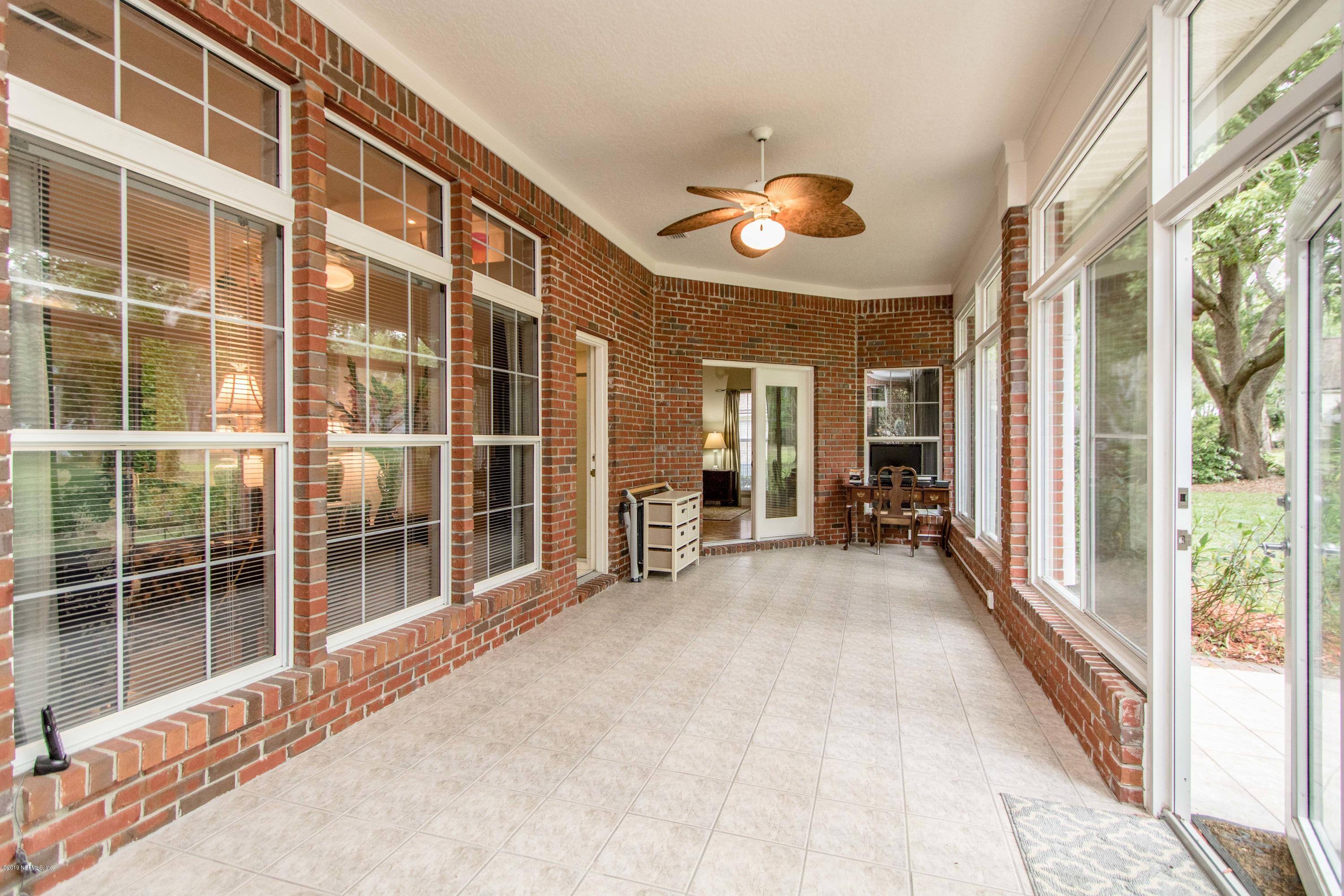 1944 Salt Myrtle Lane Fleming Island, FL 32003 - Photo 40 of 76 Sunroom