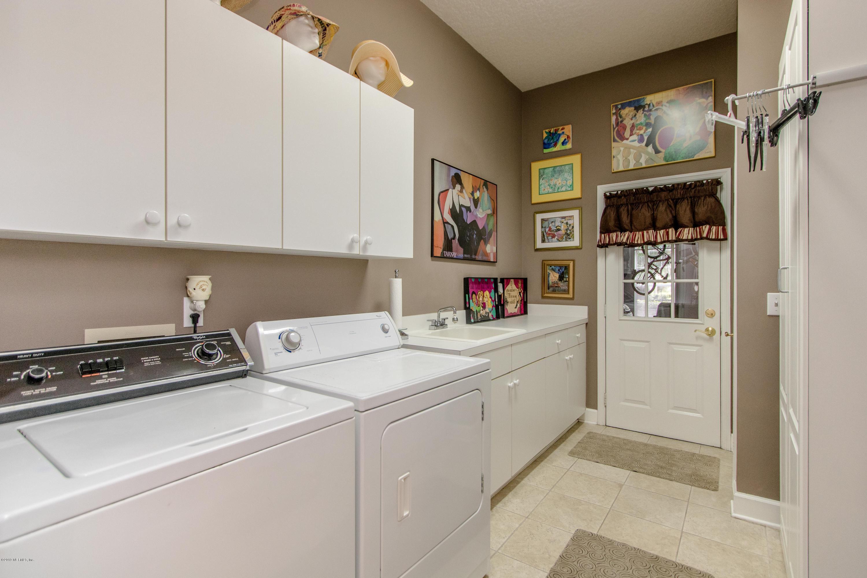 1944 Salt Myrtle Lane Fleming Island, FL 32003 - Photo 49 of 76 Laundry Room
