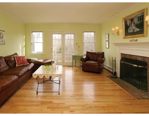 348 Weston Road Wellesley, MA 02482 - Photo 2 of 7 a living room with furniture and a fireplace