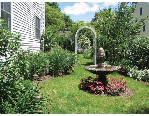 348 Weston Road Wellesley, MA 02482 - Photo 7 of 7 a front view of a house with garden