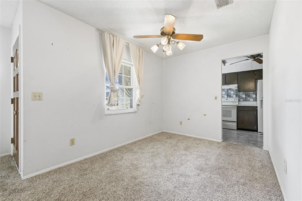 520 Jupiter Way Casselberry, FL 32707 - Photo 12 of 49 a view of an empty room with a window