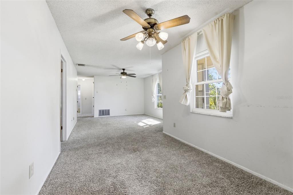 520 Jupiter Way Casselberry, FL 32707 - Photo 14 of 49 a view of an empty room with a window