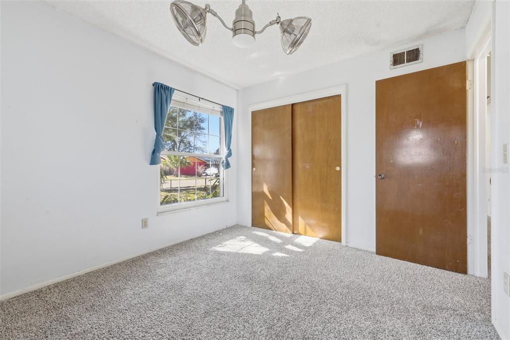 520 Jupiter Way Casselberry, FL 32707 - Photo 33 of 49 a view of an empty room with a window