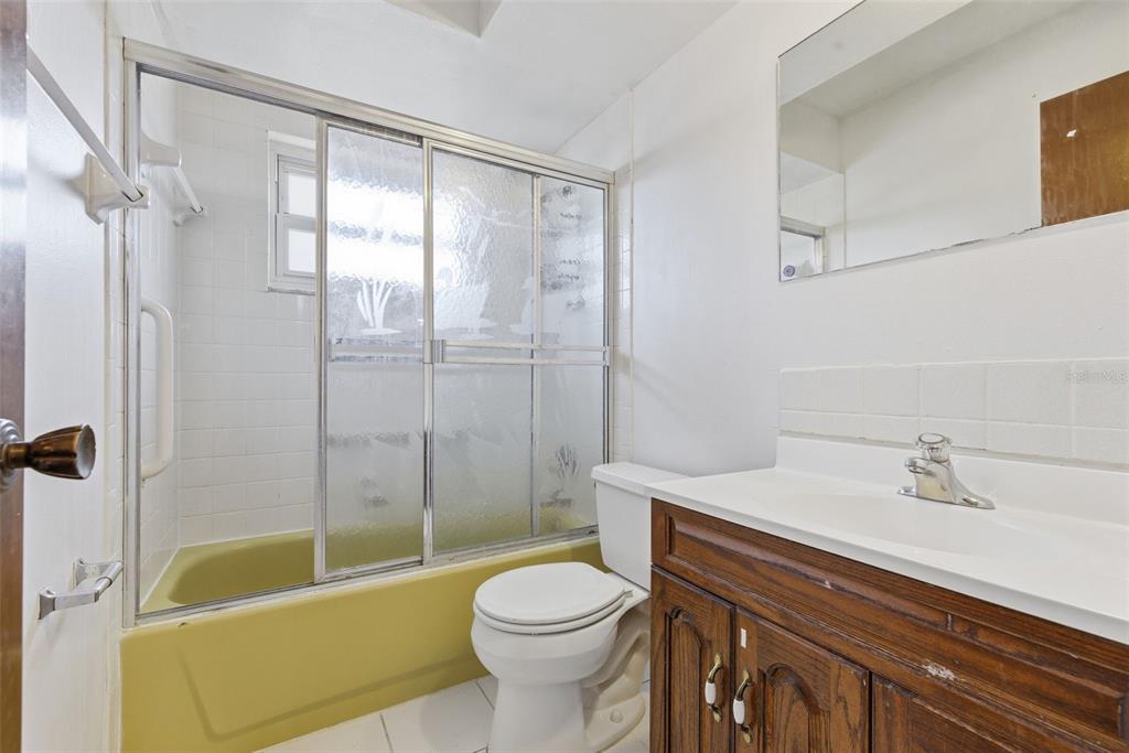 520 Jupiter Way Casselberry, FL 32707 - Photo 34 of 49 a bathroom with a sink toilet and shower