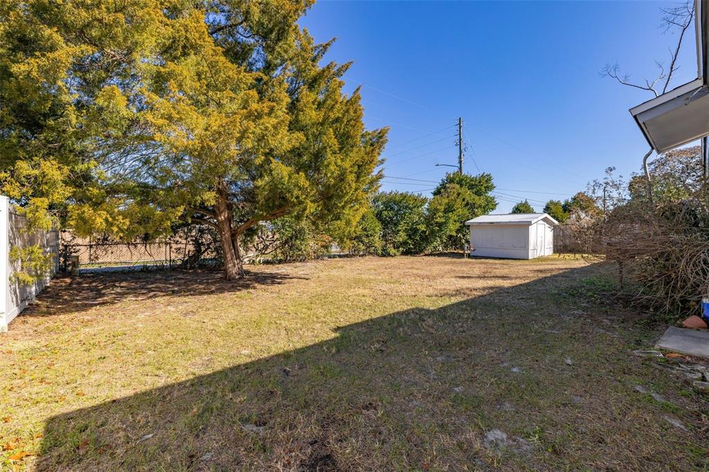 520 Jupiter Way Casselberry, FL 32707 - Photo 41 of 49 a street view with large trees