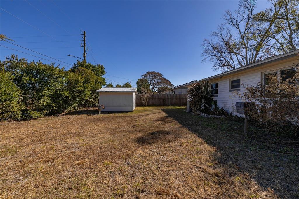 520 Jupiter Way Casselberry, FL 32707 - Photo 42 of 49 a view of a house with a yard and a tree