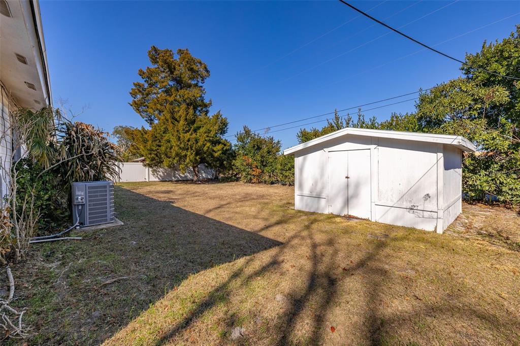 520 Jupiter Way Casselberry, FL 32707 - Photo 43 of 49 a view of a tiny house with a yard