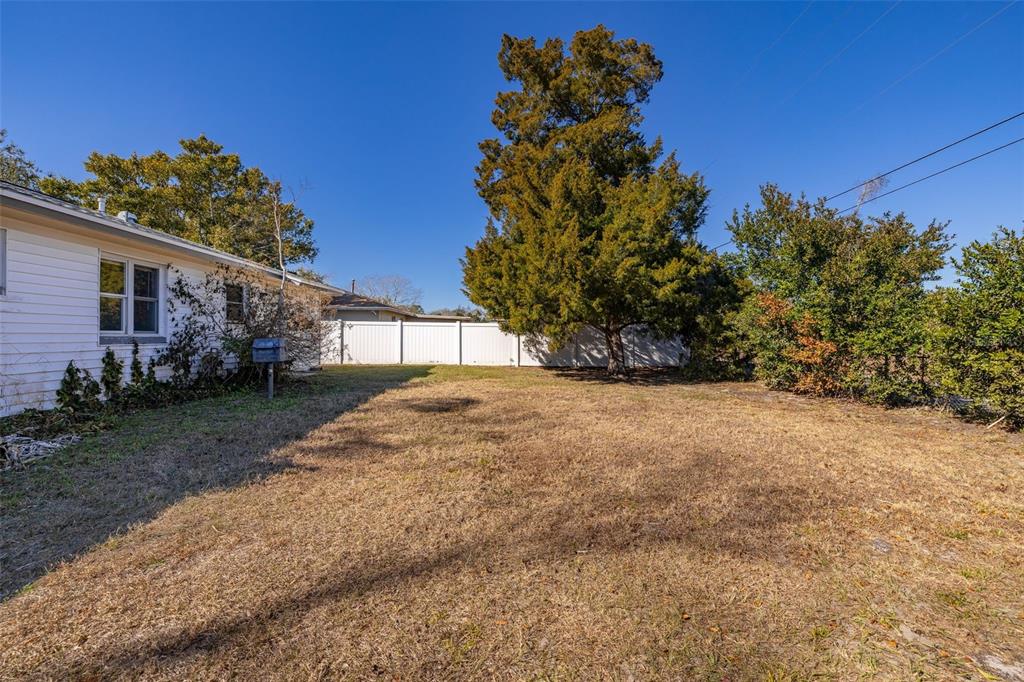 520 Jupiter Way Casselberry, FL 32707 - Photo 45 of 49 a view of a house with a yard
