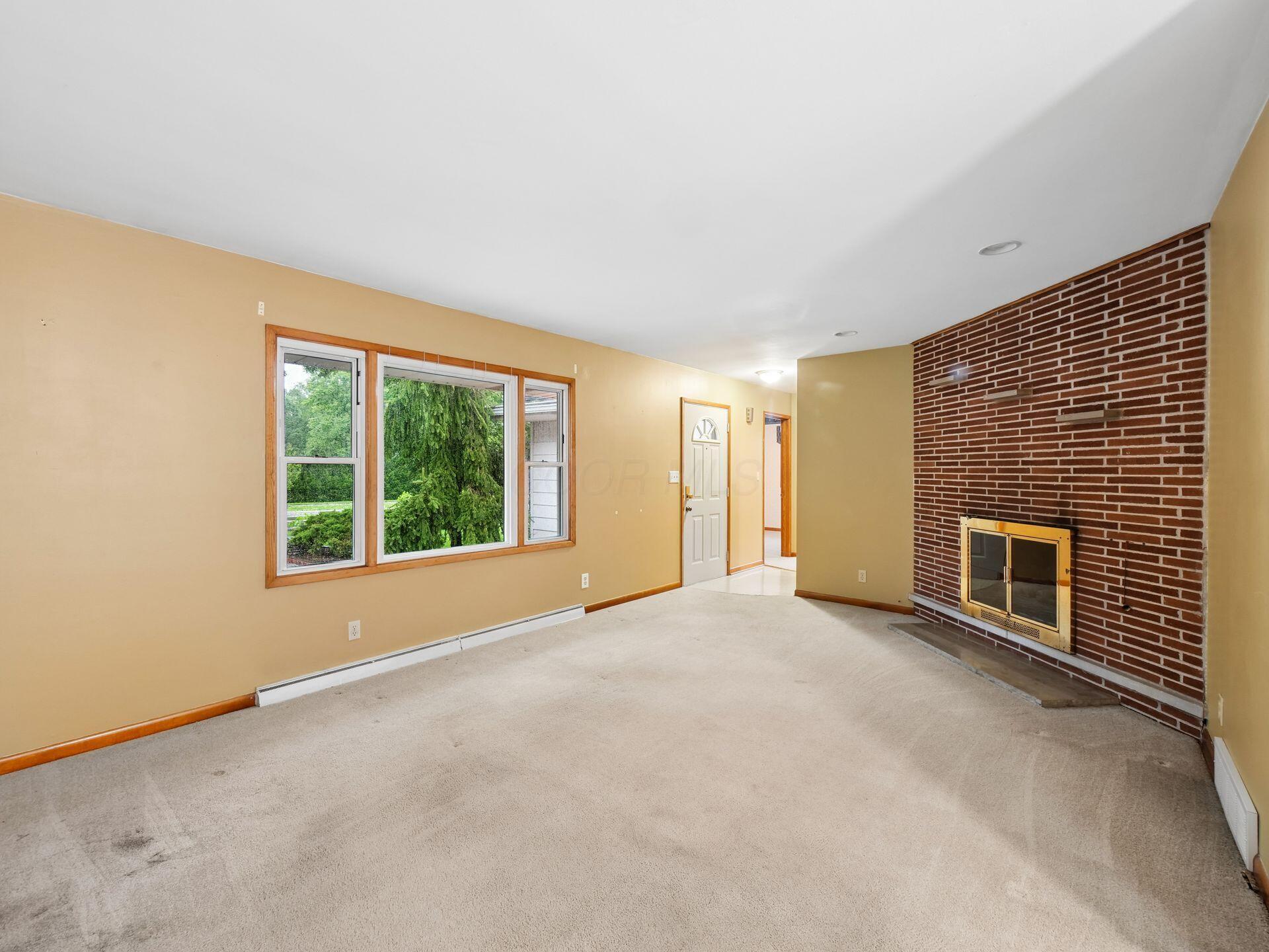 2433 Fishinger Road Upper Arlington, OH 43221 - Photo 2 of 51 Living Room to Front Entry