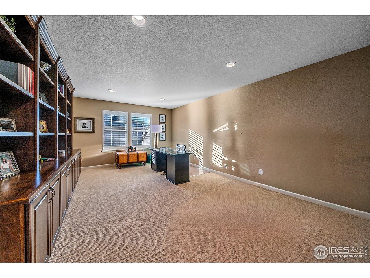 4545 South Monaco Street, Unit 324 Denver, CO 80237 - Photo 20 of 36 a view of empty room with wooden floor