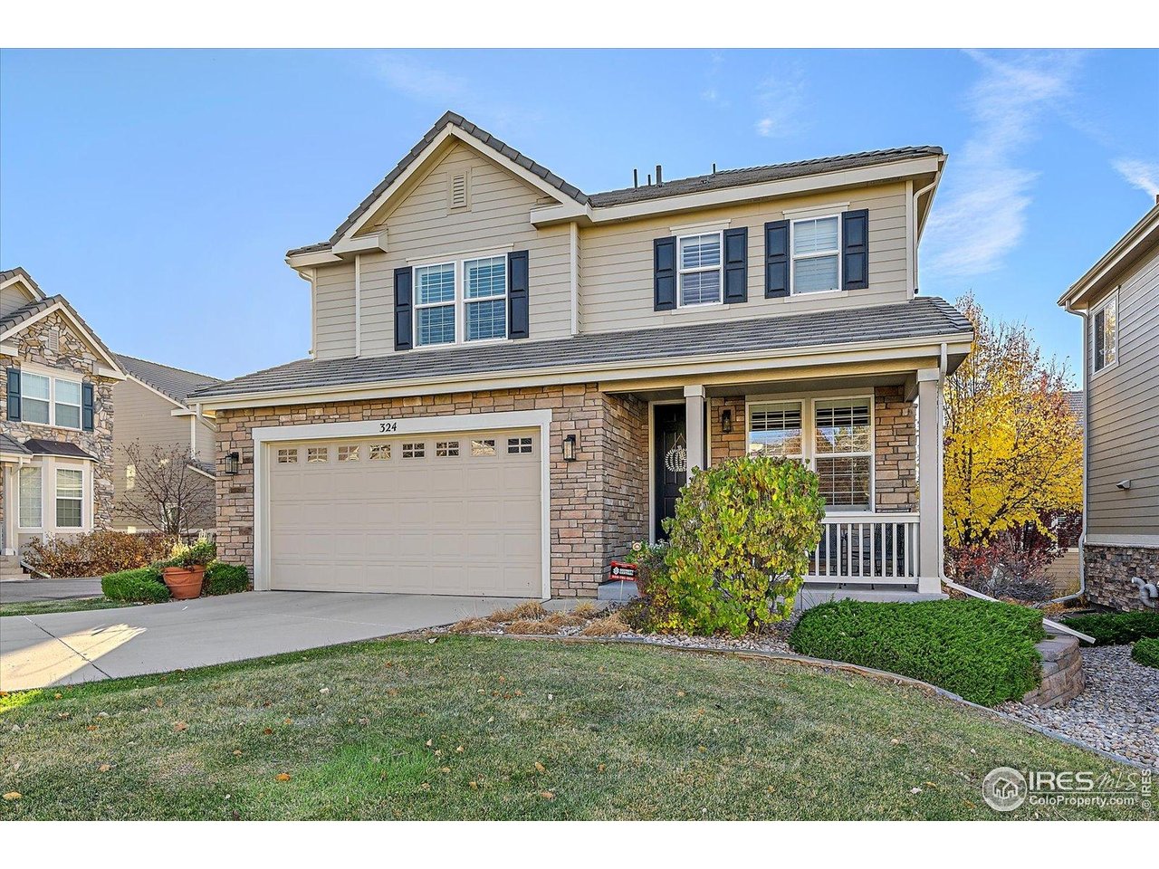 4545 South Monaco Street, Unit 324 Denver, CO 80237 - Photo 3 of 36 a front view of building with yard