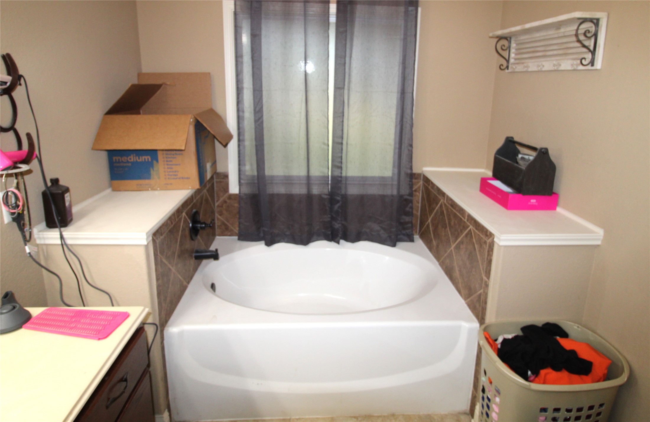 14620 Lyric Road Conroe, TX 77302 - Photo 22 of 43 a en suite bathroom with a sink and a mirror