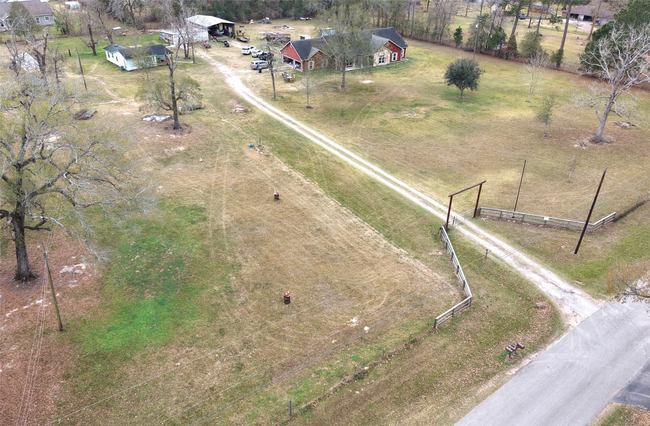 14620 Lyric Road Conroe, TX 77302 - Photo 36 of 43 a view of a backyard of a house