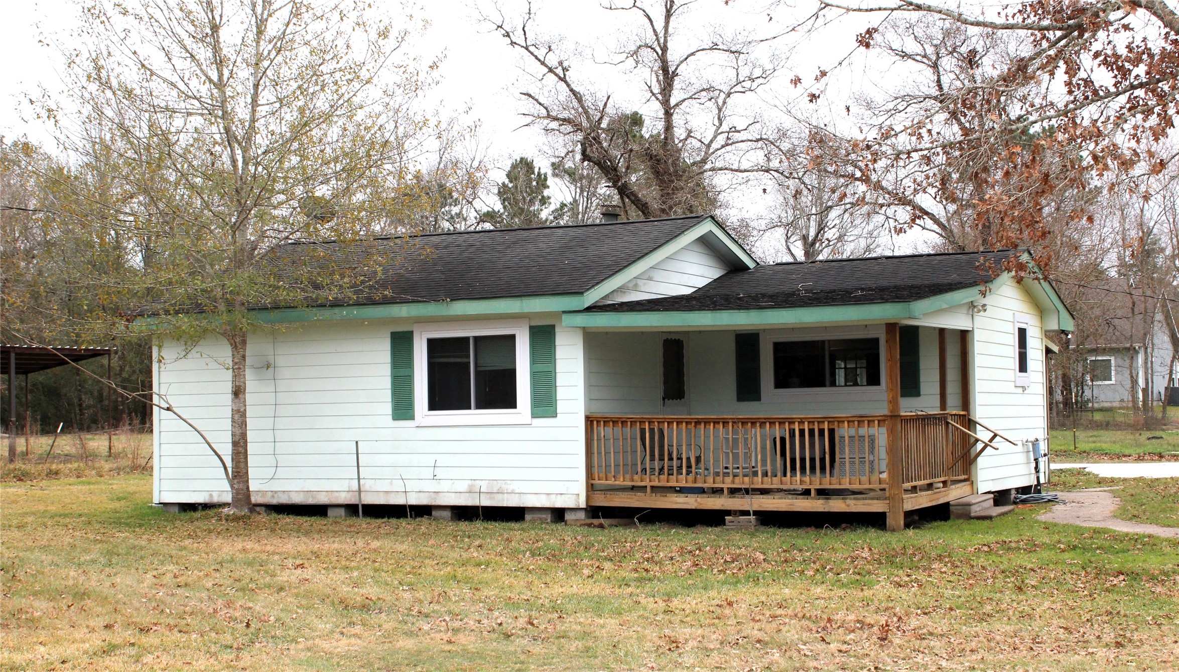 14620 Lyric Road Conroe, TX 77302 - Photo 37 of 43 a view of a house with a yard