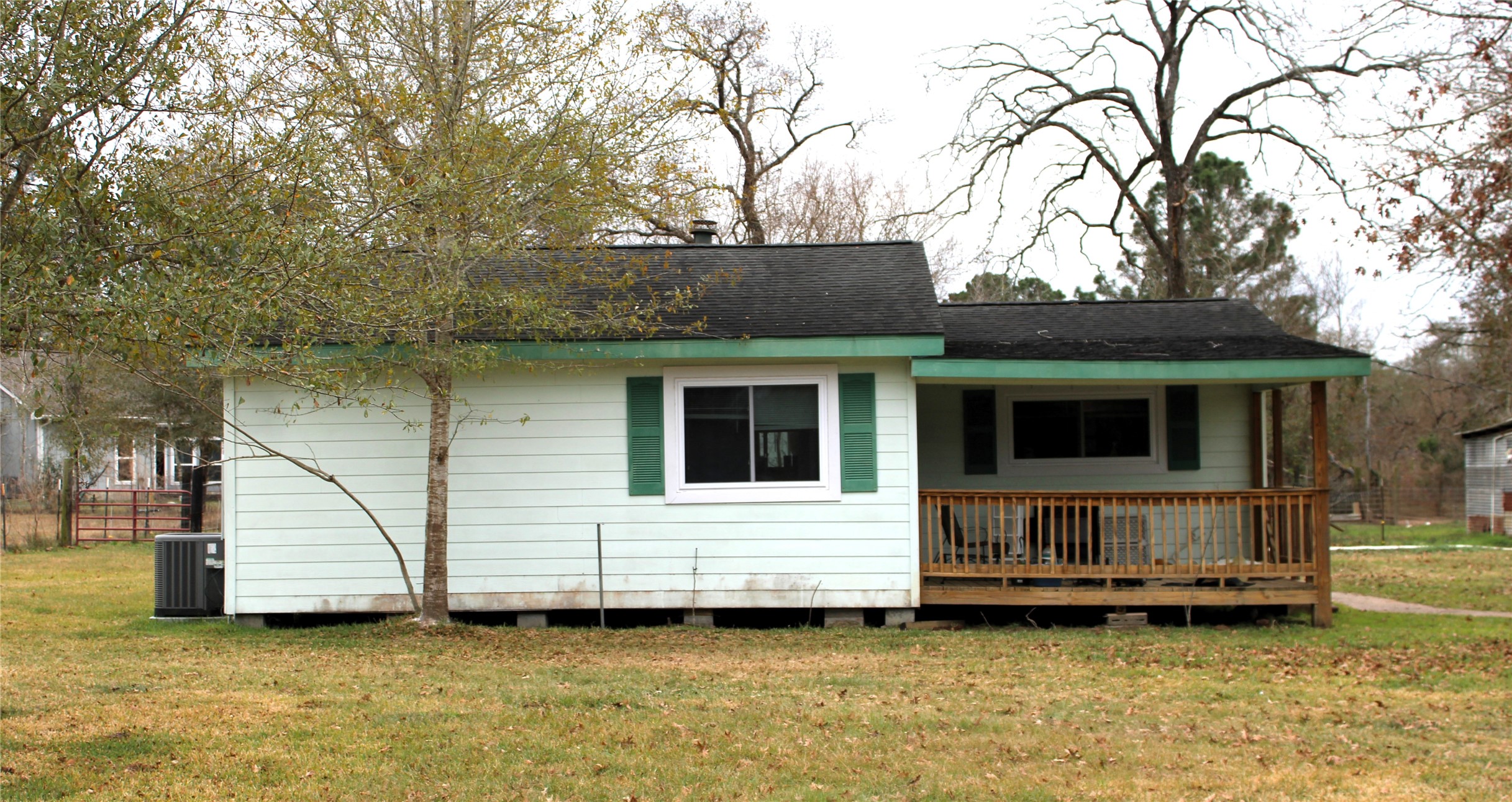 14620 Lyric Road Conroe, TX 77302 - Photo 38 of 43 a view of a house with a yard