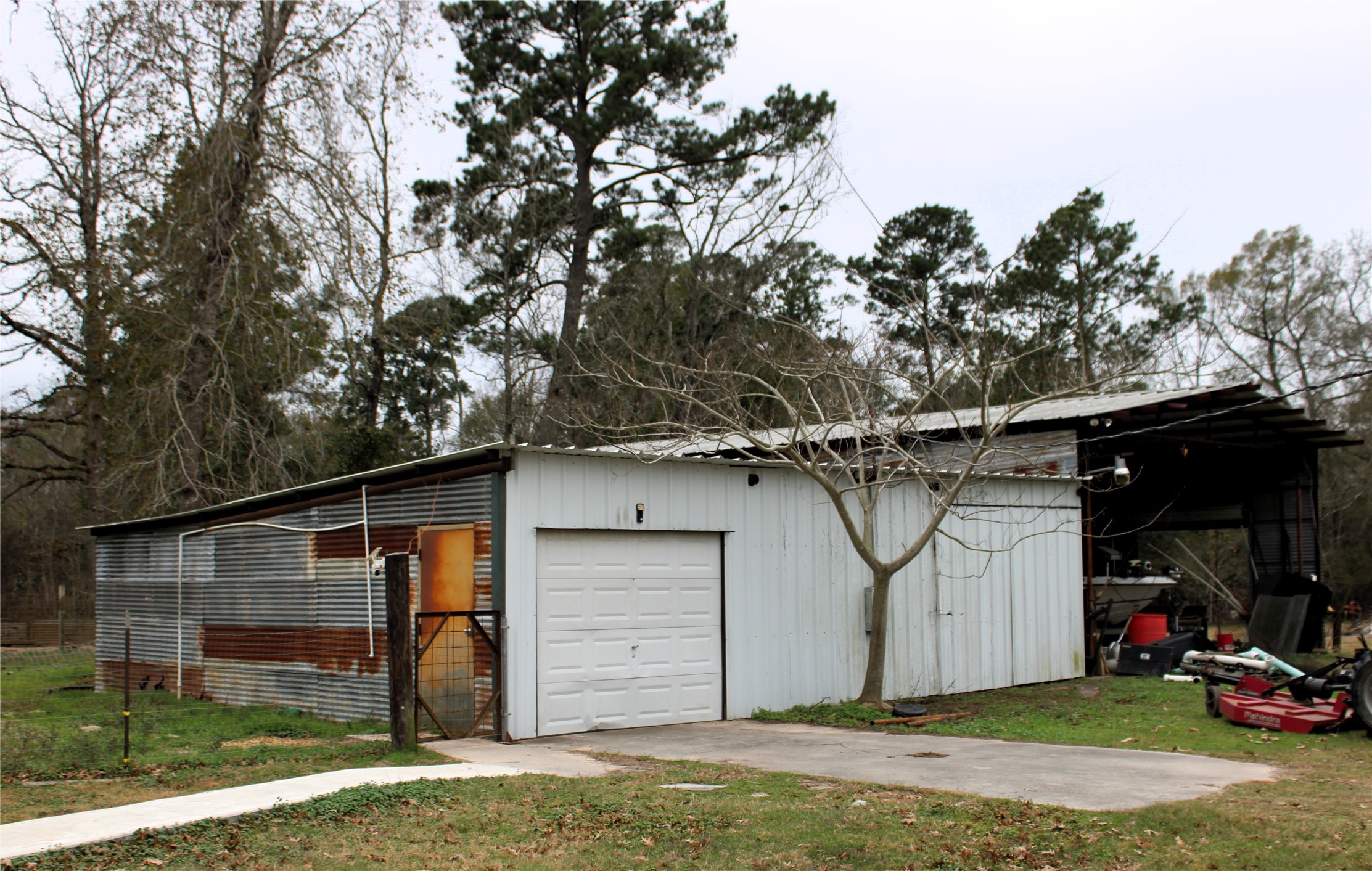 14620 Lyric Road Conroe, TX 77302 - Photo 39 of 43 a front view of a house with garden