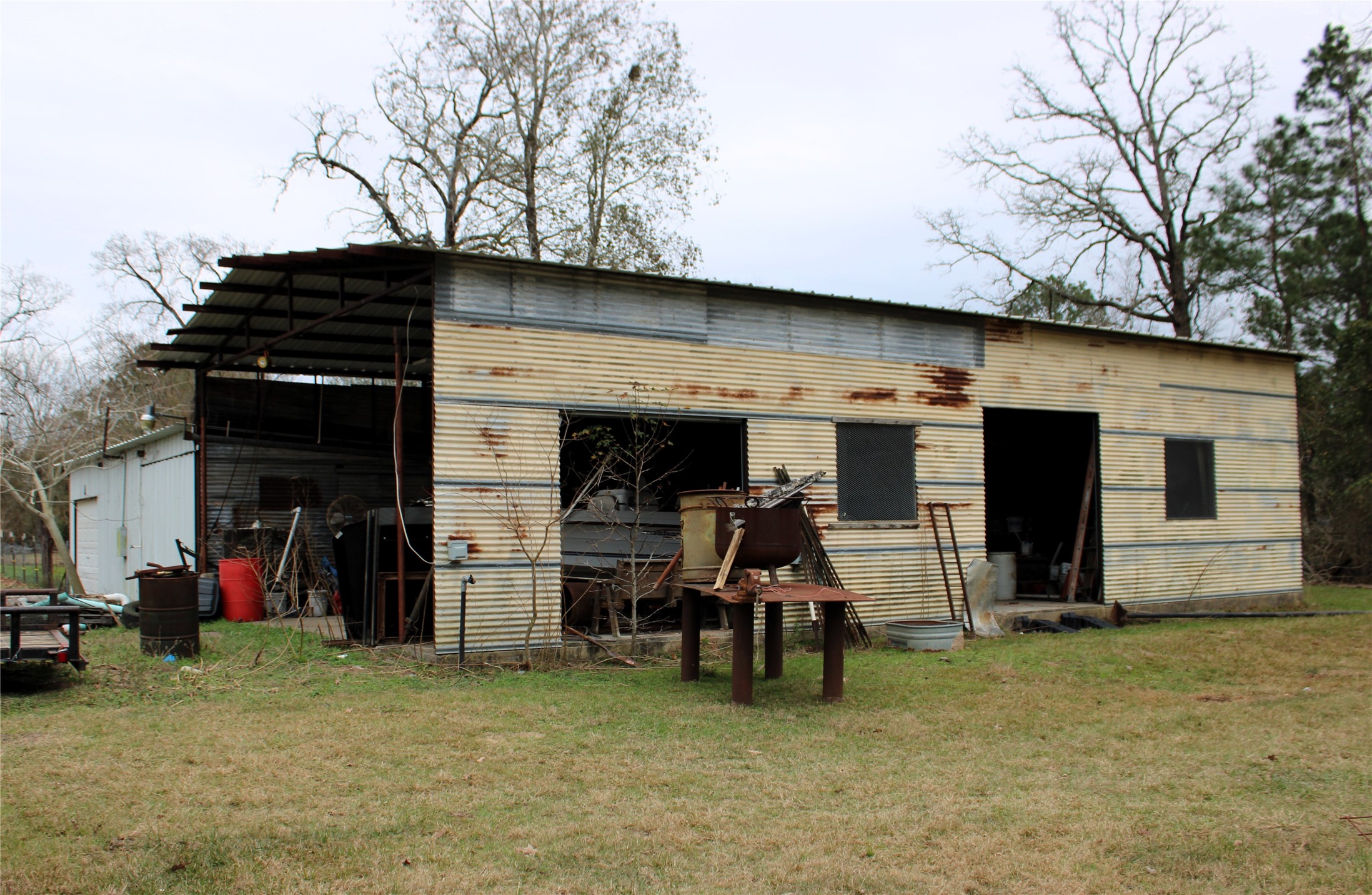 14620 Lyric Road Conroe, TX 77302 - Photo 40 of 43 a view of a children toys back of the house