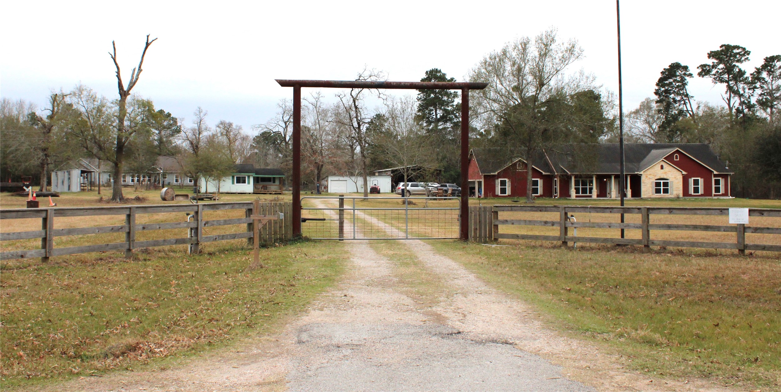 14620 Lyric Road Conroe, TX 77302 - Photo 4 of 43 a swimming pool with trees in front of it