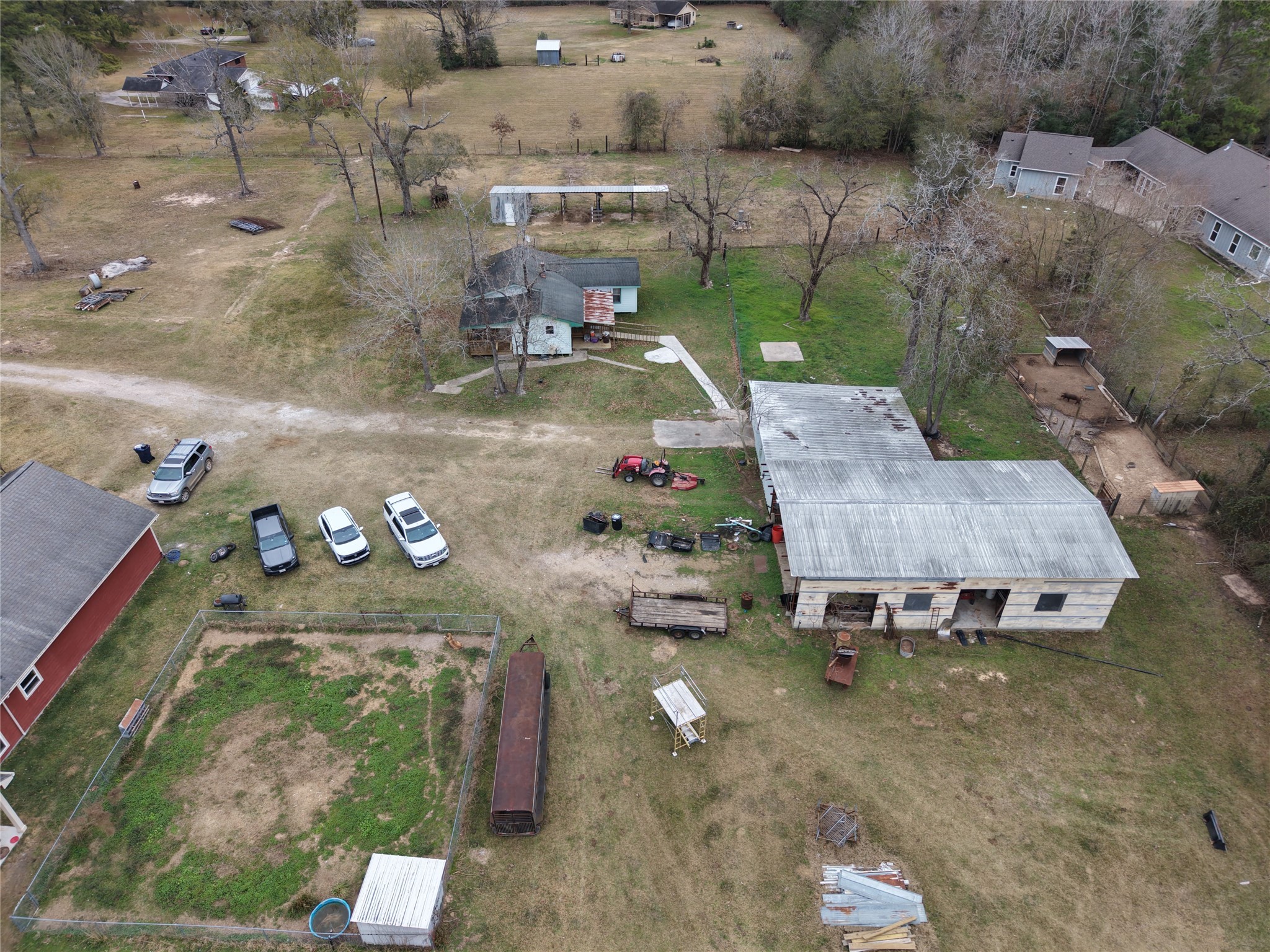 14620 Lyric Road Conroe, TX 77302 - Photo 43 of 43 an aerial view of a house with a yard