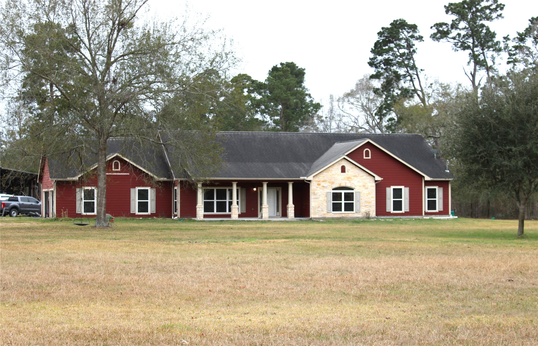 14620 Lyric Road Conroe, TX 77302 - Photo 7 of 43 a front view of a house with a yard