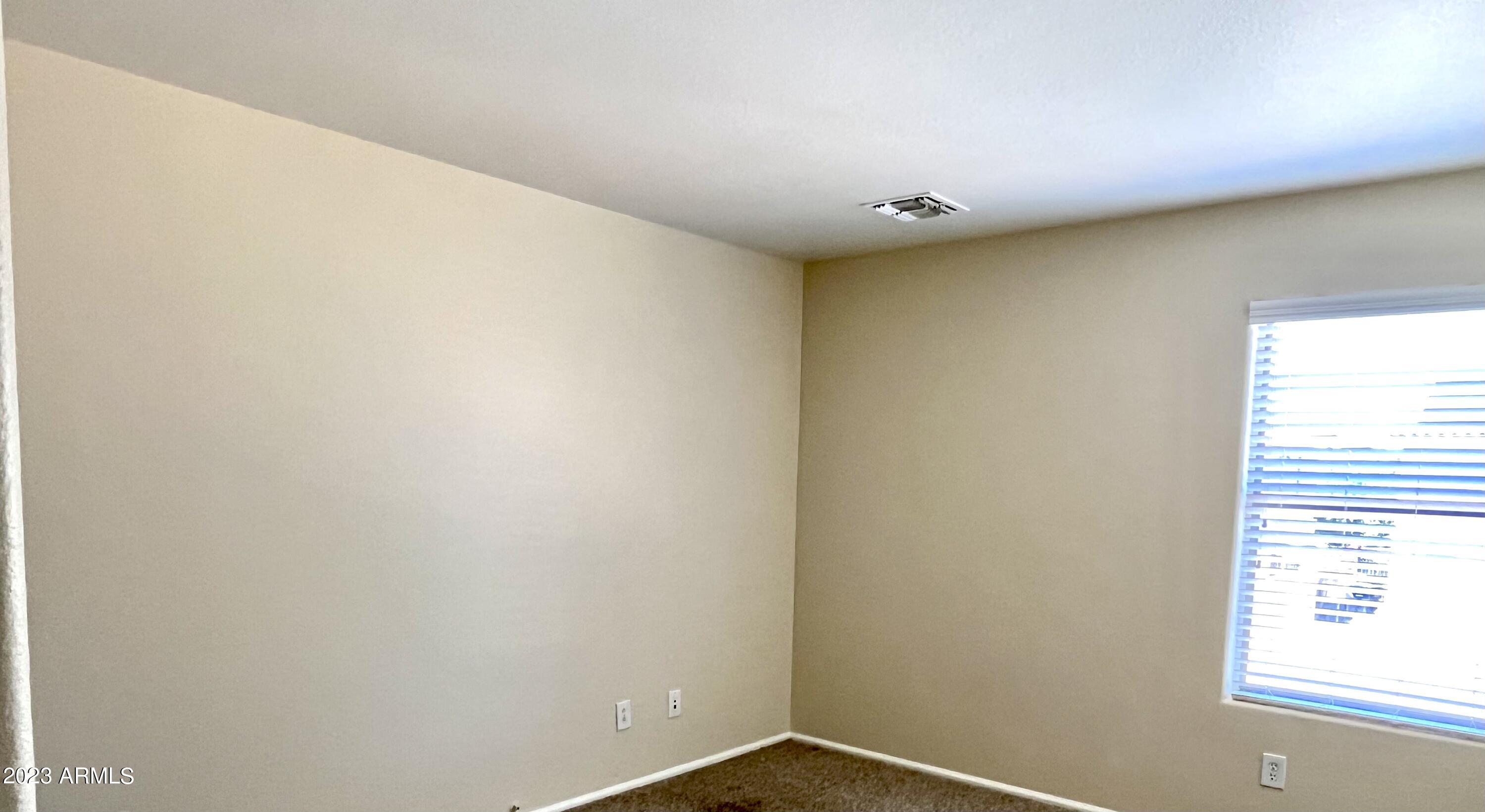 16640 West Rimrock Street Surprise, AZ 85388 - Photo 18 of 18 a view of a small space with a window