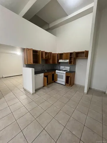 an empty room with a bench