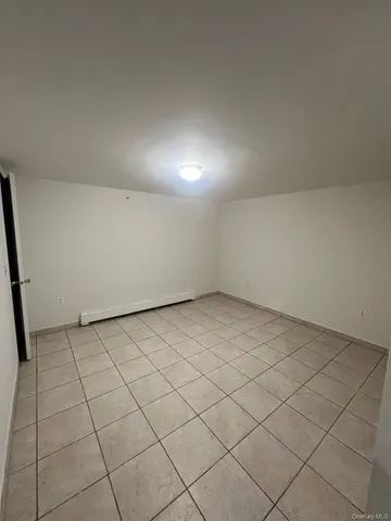 a view of a room with an empty space