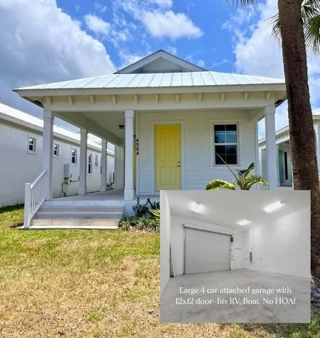 a view of living room with furniture and a yard
