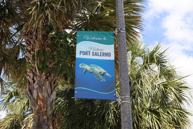 a sign that is on a brick wall