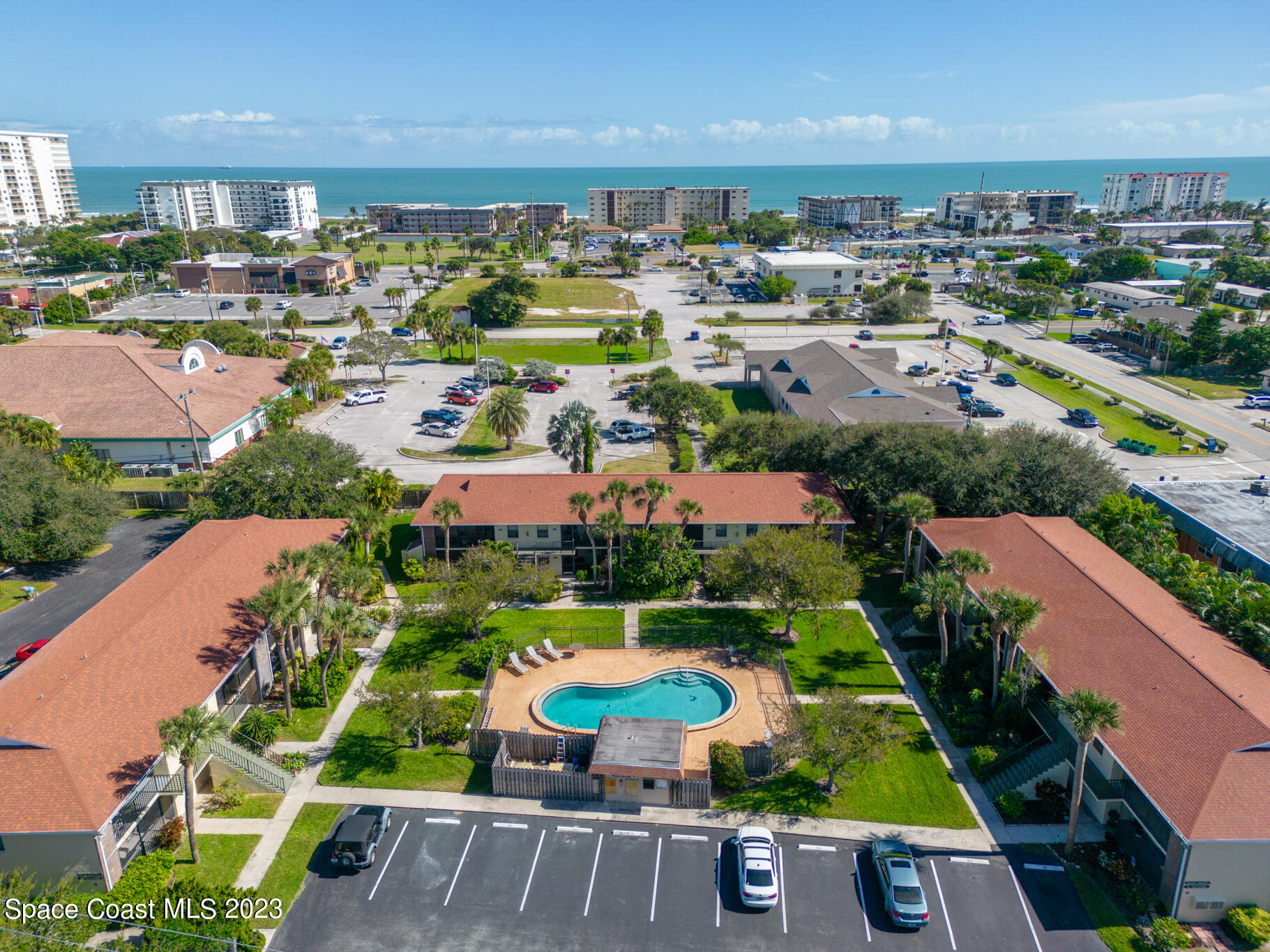 500 Catalina Road, Unit 103 Cocoa Beach, FL 32931 - Photo 21 of 28 an aerial view of multiple house