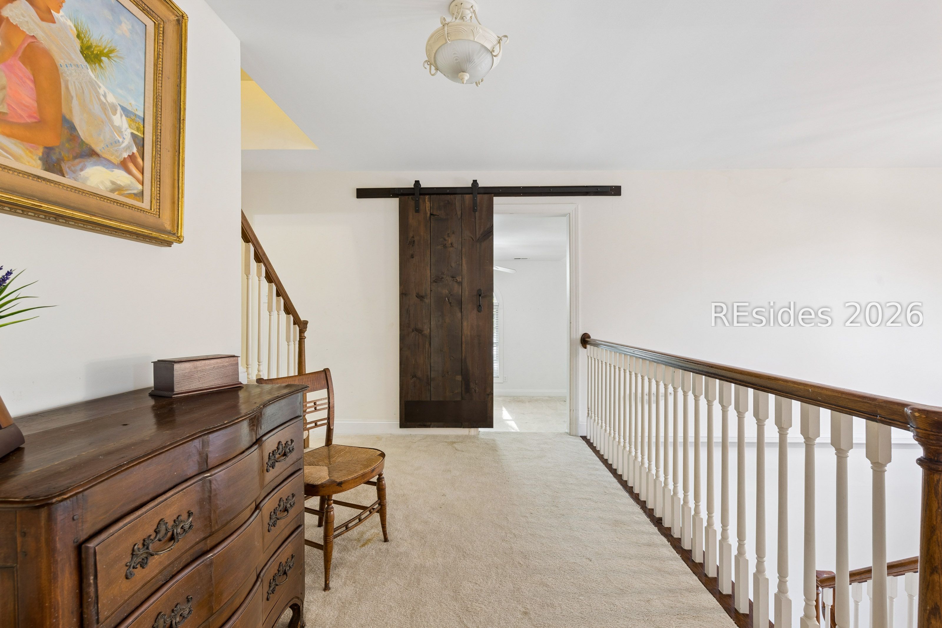28 Meridian Point Drive Bluffton, SC 29910 - Photo 50 of 65 2nd floor landing=barn door leads to den on 2nd fl