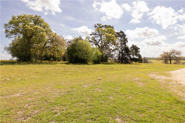 a view of a lake from a yard
