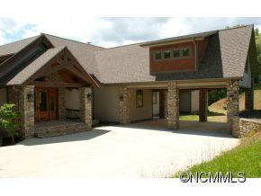 145 Fieldstone Road Clyde, NC 28721 - Photo 2 of 24 a front view of a house with a yard