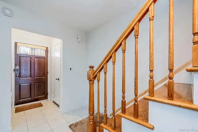 a view of an entryway with hardwood