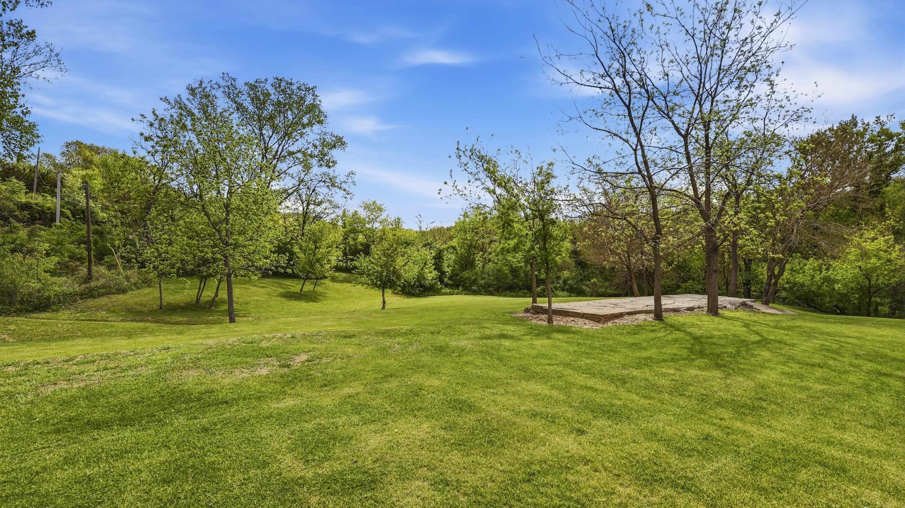 2562 West Blackjack Road Galena, IL 61036 - Photo 62 of 75 a view of a playground with a tree