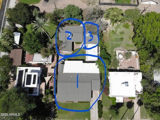 a living room with furniture ceiling fan and a window