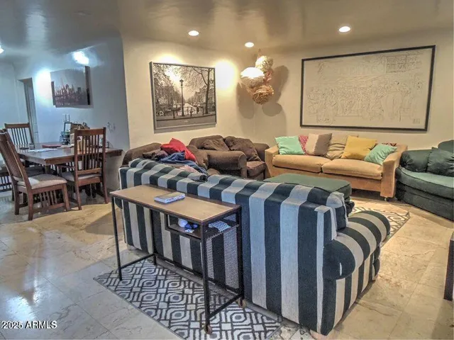 a kitchen with appliances a counter space and a window