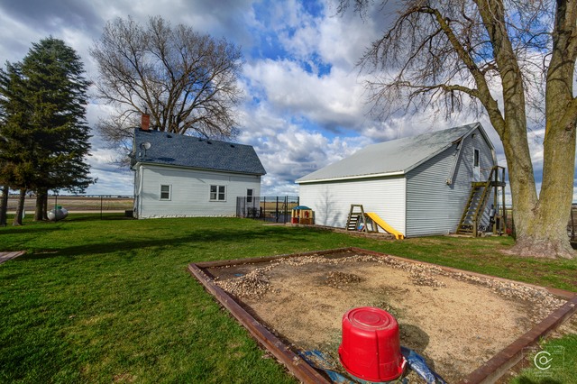 4670 Rich Road DeKalb, IL 60115 - Photo 21 of 24 a view of a house with a yard