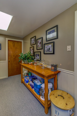 4670 Rich Road DeKalb, IL 60115 - Photo 6 of 24 a room with pool table and paintings on the wall