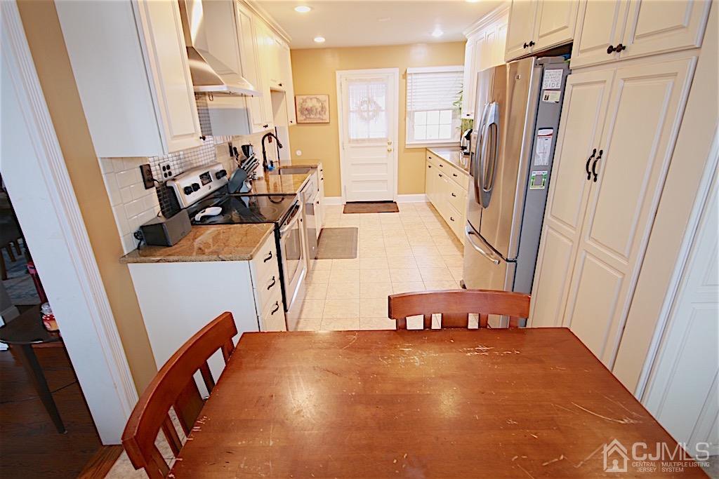 177 Midfield Road Colonia, NJ 07067 - Photo 3 of 20 a view of a room with front door