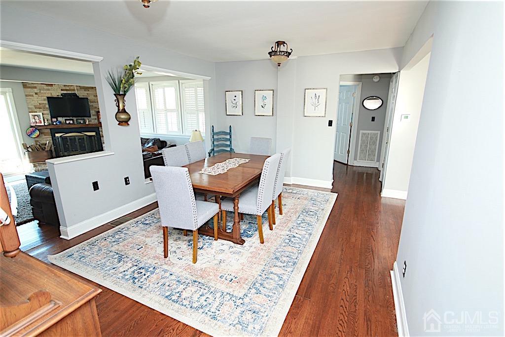 177 Midfield Road Colonia, NJ 07067 - Photo 4 of 20 a living room with furniture and a flat screen tv